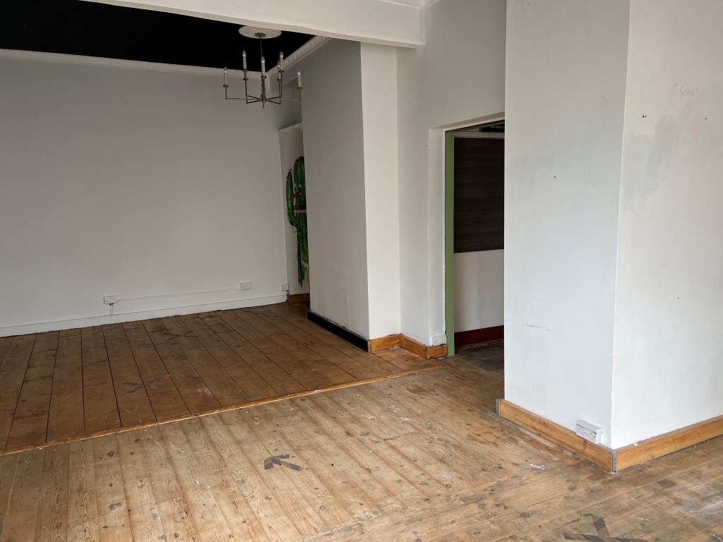 Lot: 47 - TWO STOREY TOWN CENTRE COMMERCIAL PREMISES - Looking Towards the Rear of the Shop